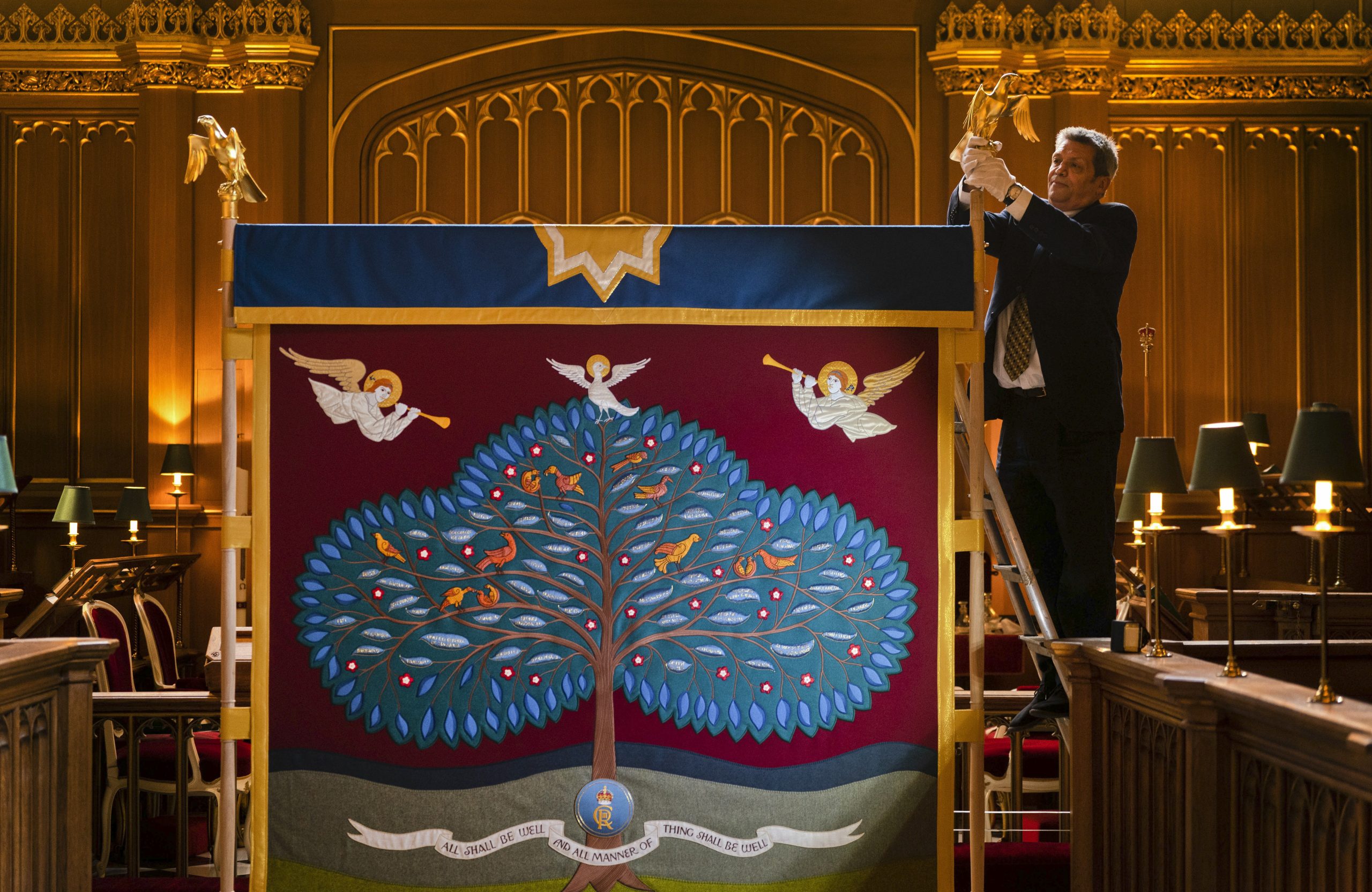 Nick Gutfreund, Cabinet Maker and Anointing Screens Project Lead, adjusts the anointing screen which will be used in the coronation of King Charles III, in the Chapel Royal at St James's Palace in London.